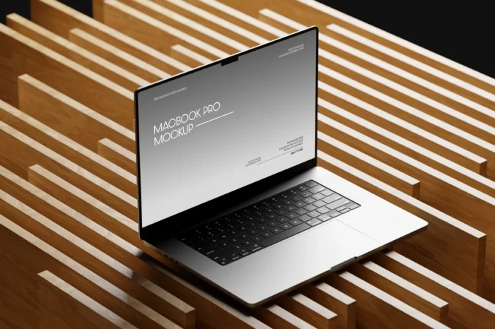 Free MacBook Pro Mockup on Wooden Surface for showcasing digital designs and branding.