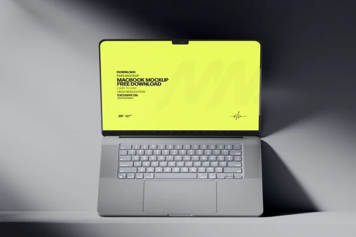 Free MacBook Pro Mockup in Dark for showcasing UI/UX designs and app interfaces.