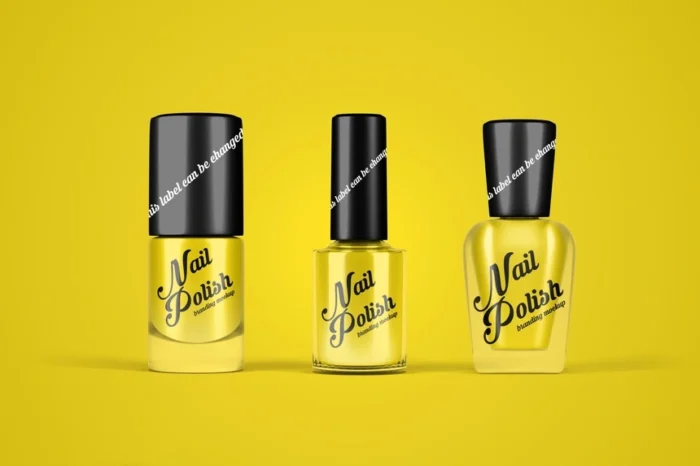 Three yellow nail polish bottles with black caps on a yellow background, showcasing Nail Polish Bottle Mockup design.