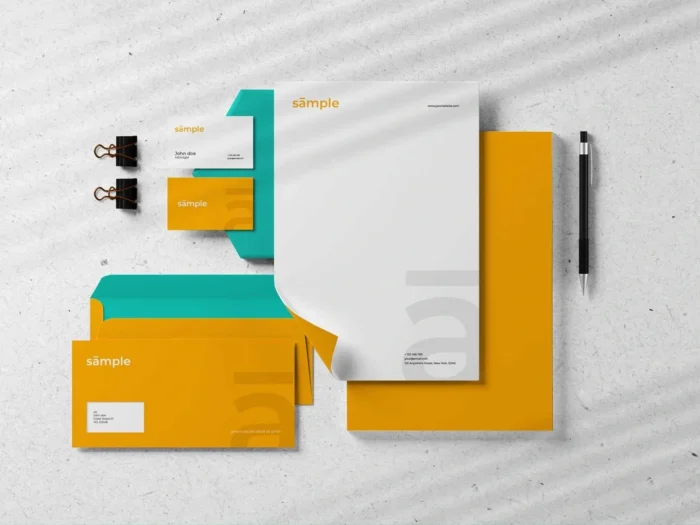 Free Stationery Mockup Set with letterhead, business cards, envelope, and pen for brand identity.