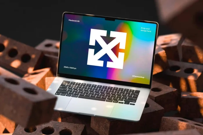 Free Rusty MacBook Air Mockup with realistic texture for showcasing designs and branding.