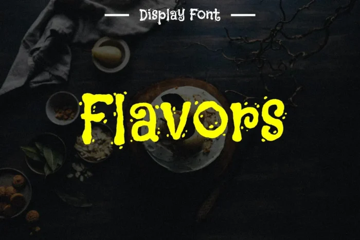 FLAVORS rugged display font with textured, scattered salt particle effect, perfect for food and Halloween designs