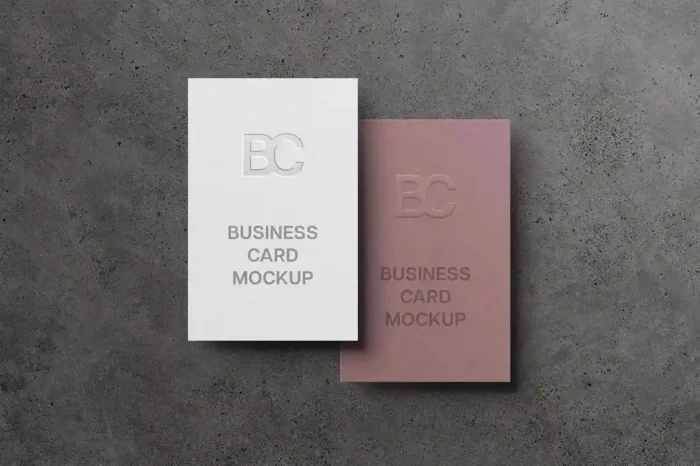 Free 85x55 vertical business card mockup PSD with realistic lighting and editable background