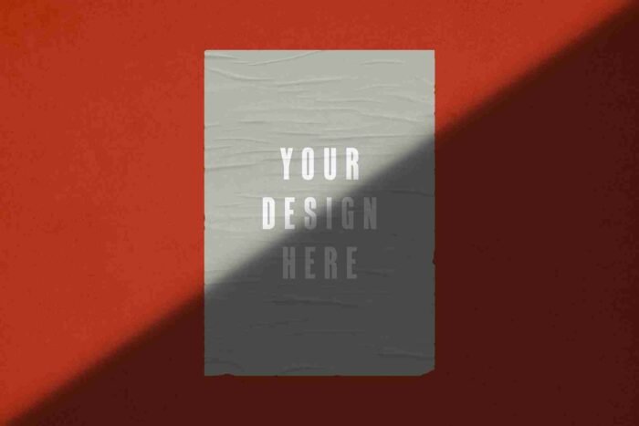 Realistic poster mockup with crumpled texture and shadow overlay for professional design displays.