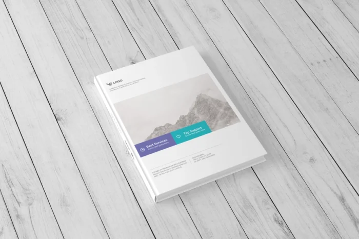 A5 hardcover book mockup placed on a realistic wooden table surface with natural lighting and front cover design.
