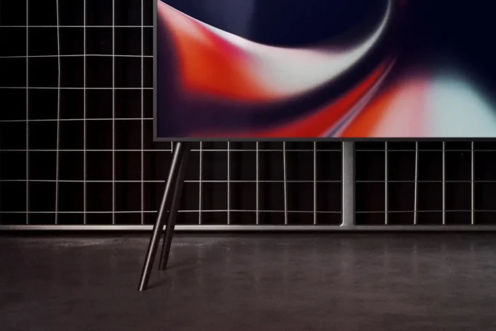 Realistic TV mockup with concrete floor and smart object layers