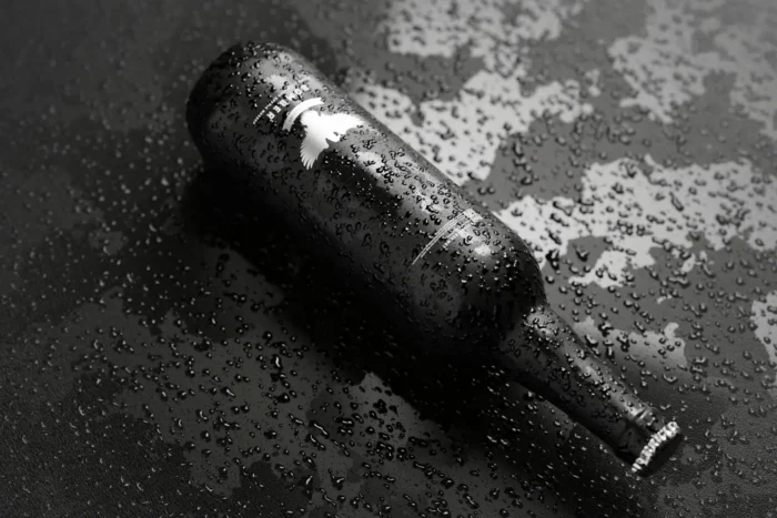 Free Realistic Bomber Style Beer Bottle Mockups psdt