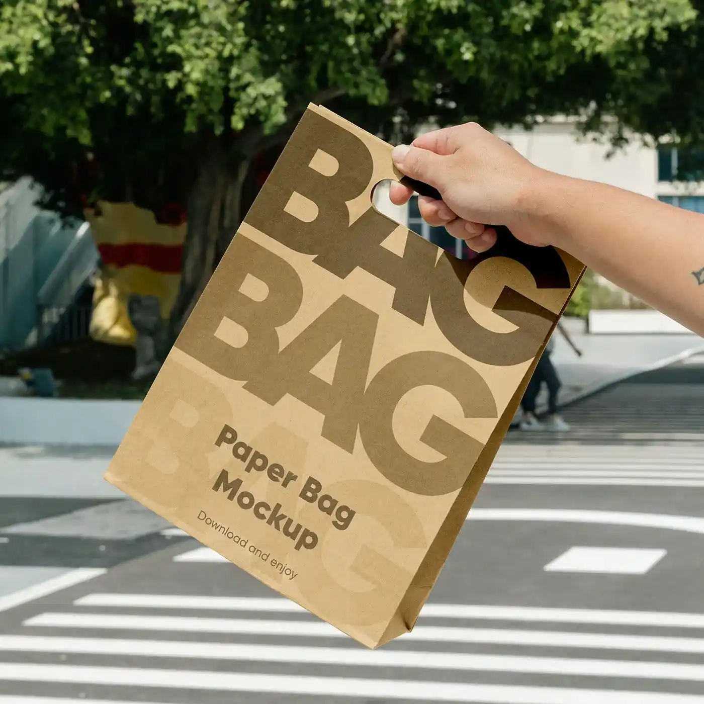 Free Paper Bag in Hand Mockup PSD