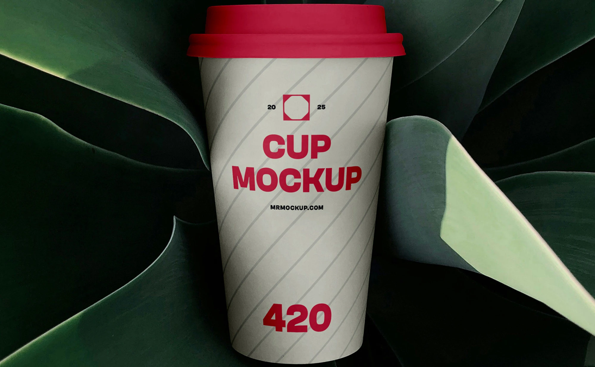 Free Coffee Cup Surrounded by Plant Mockup