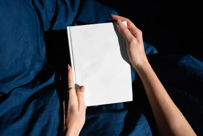 Free Woman Holding Book PSD Mockup 03