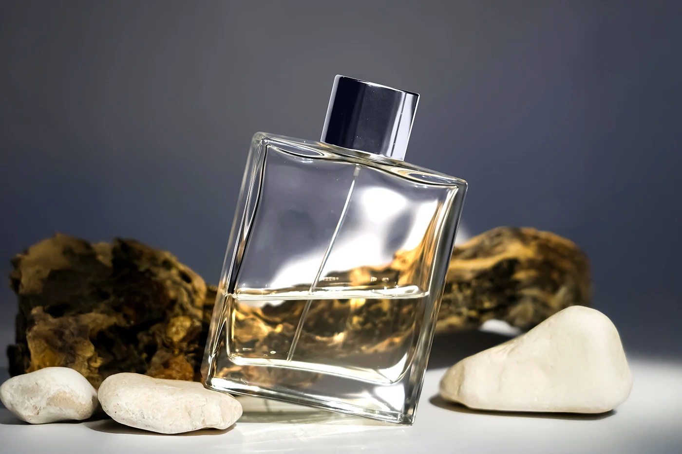 Perfume-Bottle-on-Stone-Mockup.webp